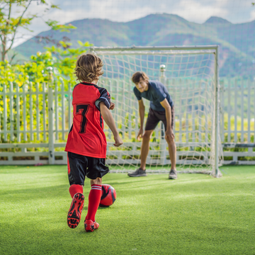 Playing football in Primary PE